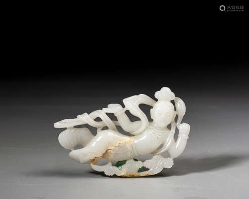 A CARVED WHITE JADE FIGURE OF FLYING APSARAS