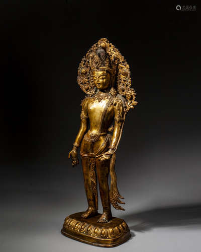 A GILT-BRONZE FIGURE OF PADMAPANI LOKESHVARA, TIBET, 13TH CT...