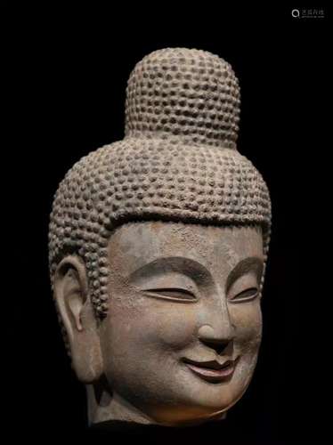 A QINGZHOU STONE HEAD OF BUDDHA