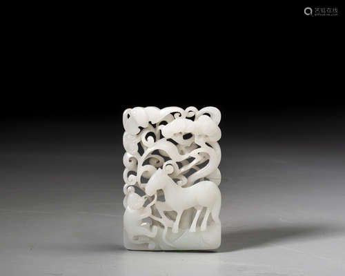 A CARVED WHITE JADE PLAQUE