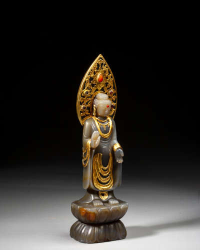 A CHINESE GOLD-INLAID JADE FIGURE OF BUDDHA