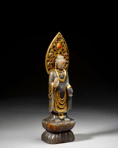 A CHINESE GOLD-INLAID JADE FIGURE OF BUDDHA