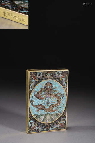 A ENAMEL 'DRAGON' PAPERWEIGHT, QING DYNASTY