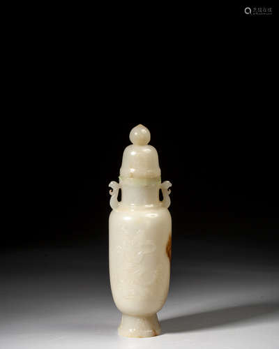 A WHITE JADE VASE AND COVER