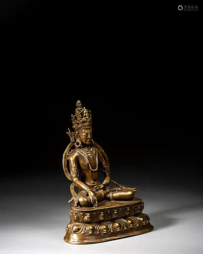 A GILT-BRONZE FIGURE OF BUDDHA