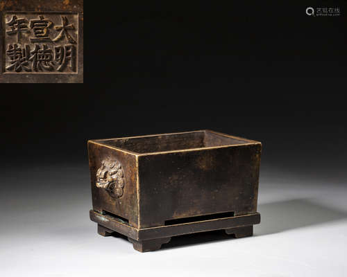 A BRONZE SQUARE CENSER