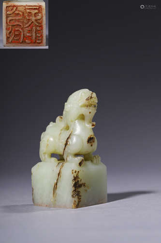 A CARVED WHITE JADE BEAST SEAL,QING DYNASTY