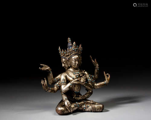 A BRASS ALLOY FIGURE OF USHNISHAVIJAYA