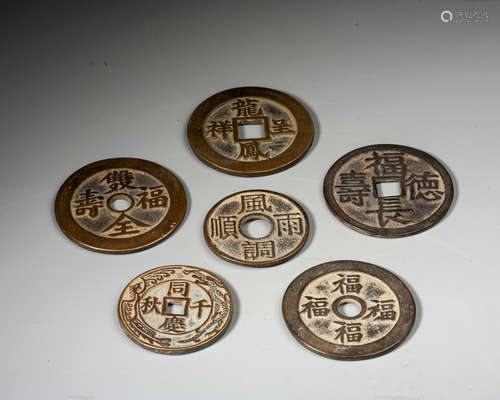 A SET OF SIX CHINESE COINS