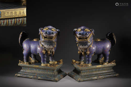 A PAIR OF CLOISONNE ENAMEL LIONS, QING DYNASTY