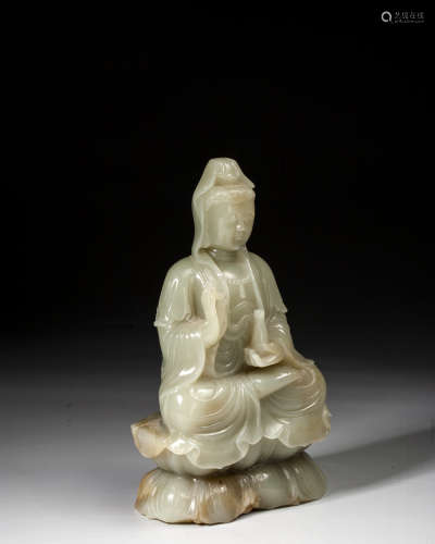 A CARVED JADE FIGURE OF GUANYIN