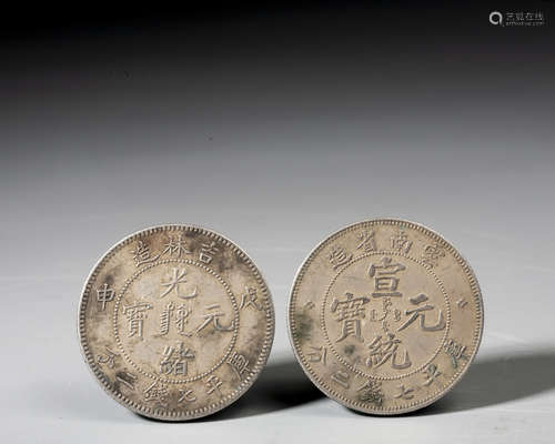 A SET OF TWO SILVER COINS, QING DYNASTY