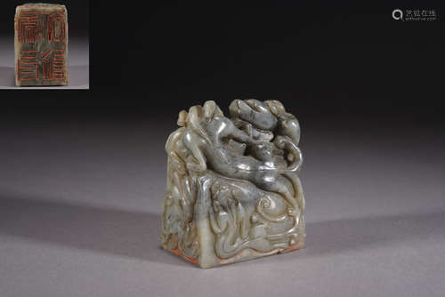 A PALE GREENISH WHITE JADE 'DRAGON' SEAL, QING DYNASTY