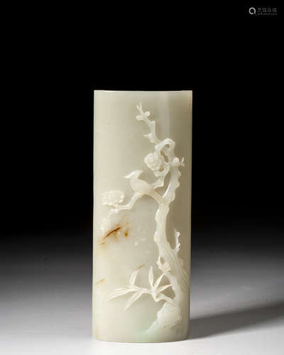 A CARVED WHITE JADE WRISTREST