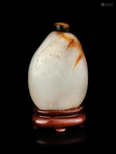 A Chinese White and Russet Jade Pebble-Form Snuff Bottle Hei...