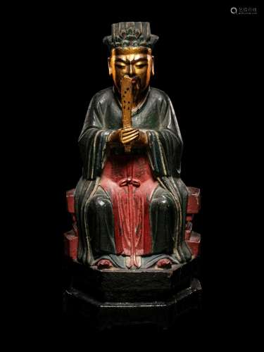 A Chinese Gilt, Red, and Black Lacquered Wood Figure of an O...