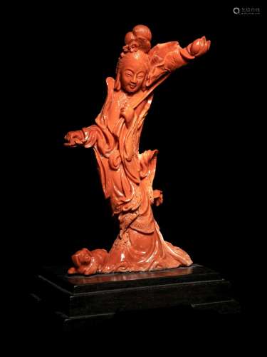 A Chinese Carved Red Coral Figure of a Female Immortal Heigh...