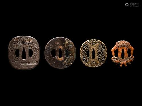 Four Japanese Metal Tsuba Length of largest 3 1/2 in., 9 cm.