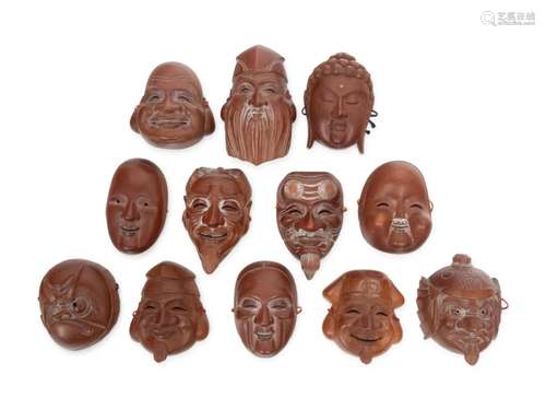 12Japanese Wood Theater Masks Average length 5 in., 12.7 cm.