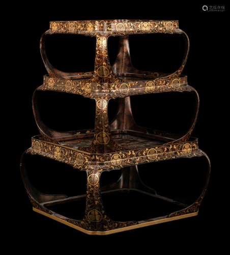 A Set of Three Japanese Gilt Decorated Lacquer Nesting Table...