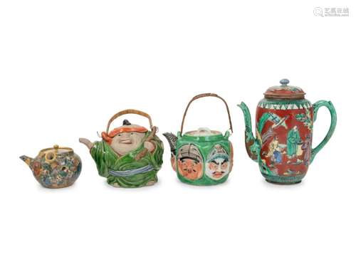 Four Japanese 'Figure' Teapots Height of tallest 8...