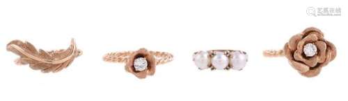 A TRIO OF INTERLOCKING FLORAL RINGS