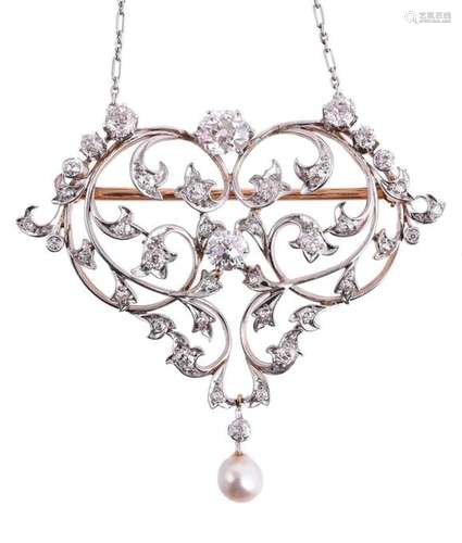 AN ART NOUVEAU DIAMOND AND PEARL BROOCH/PENDANT CIRCA 1910