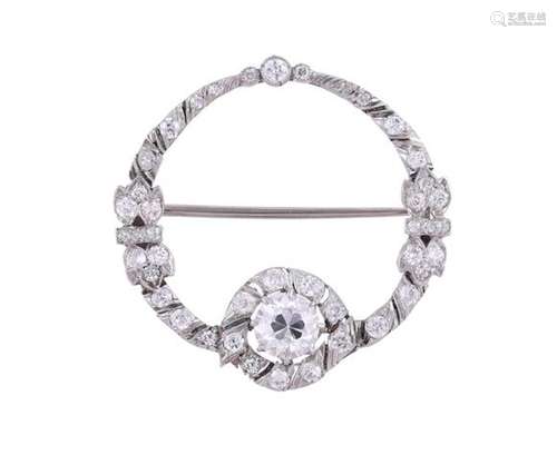 A DIAMOND CIRCLET BROOCH