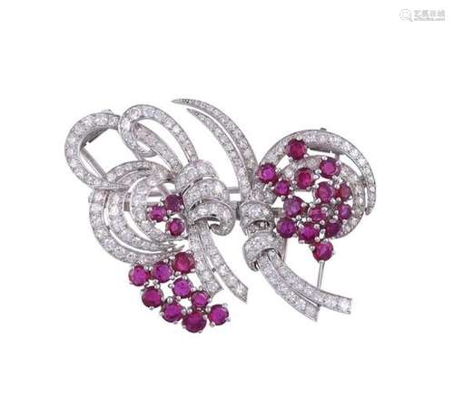 GARRARD, A MID 20TH CENTURY RUBY AND DIAMOND DOUBLE CLIP BRO...