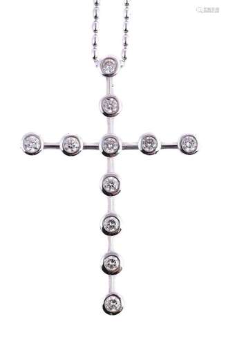 DE BEERS, AN 18 CARAT GOLD DIAMOND CROSS PENDANT