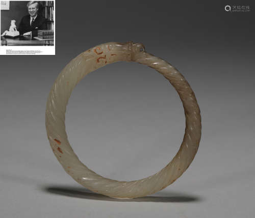 Dragon-shaped twisted silk ring in warring States period