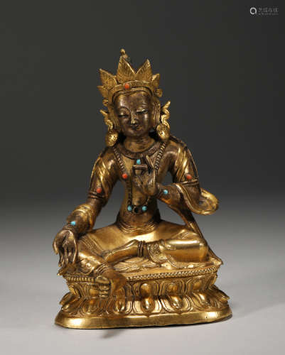 Qing Dynasty bronze gilt Buddha seated with gemstones
