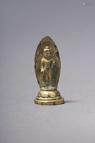 A Gilt-BRONZE STANDING SCULPTURE OF BUDDHA