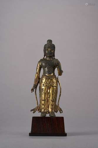 A GILT-BRONZE STANDING SCULPTURE OF BODHISATTVA