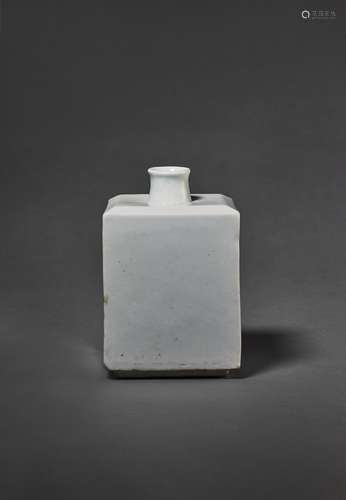 A WHITE PORCELAIN SQUARE BOTTLE