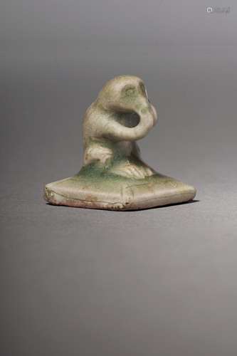 A CELADON GLAZED SEAL