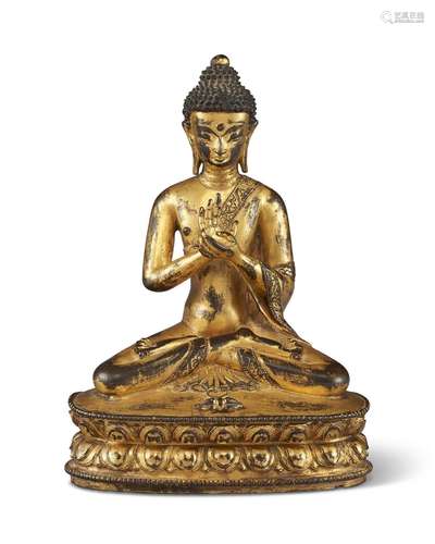 A GILT-BRONZE FIGURE OF A BUDDHA