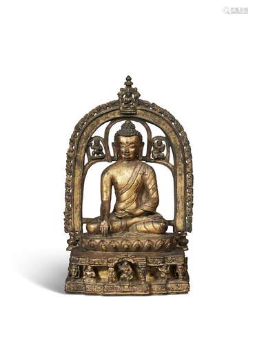 A RARE GILT-BRONZE FIGURE OF BUDDHA