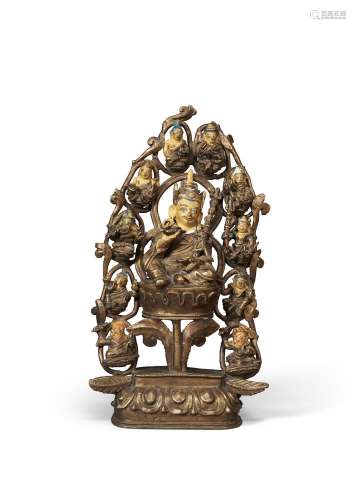 A BRONZE FIGURE OF PADMASAMBHAVA WITH MANIFESTATIONS AND DIS...