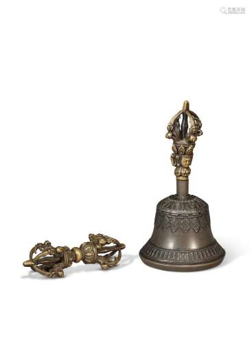 A METAL ALLOY AND BRONZE GHANTA AND A BRONZE VAJRA