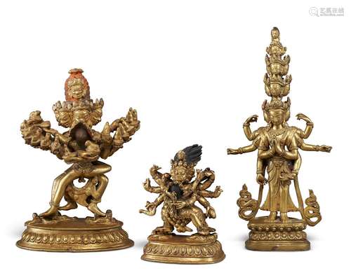 THREE GILT-BRONZE FIGURES OF DEITIES