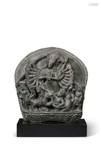 A BLACK STONE STELE OF DURGA