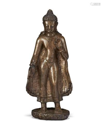 A RARE COPPER ALLOY FIGURE OF BUDDHA