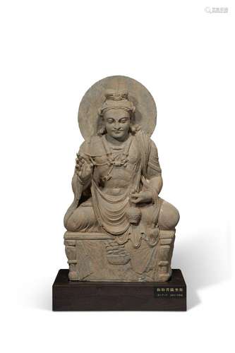 A LARGE GREY SCHIST FIGURE OF SEATED MAITREYA