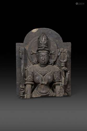 A LARGE BLACK STONE BUST OF DEVI