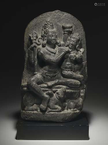 A BLACK STONE STELE OF UMAMAHESHVARA