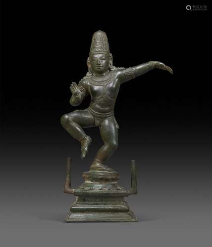 A BRONZE FIGURE OF DANCING KRISHNA