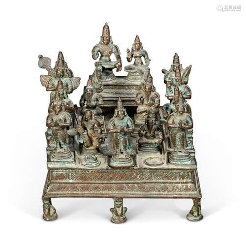 A RARE BRONZE GROUP OF VISHNU AND LAKSHMI WITH VARIOUS AVATA...