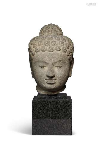 AN LARGE AND RARE ANDESITE HEAD OF BUDDHA