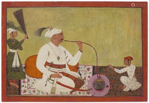 A PORTRAIT OF A RULER SMOKING A HOOKAH